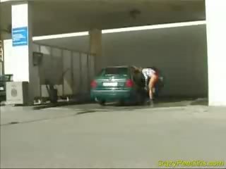 Crazy pee teenager at the car wash